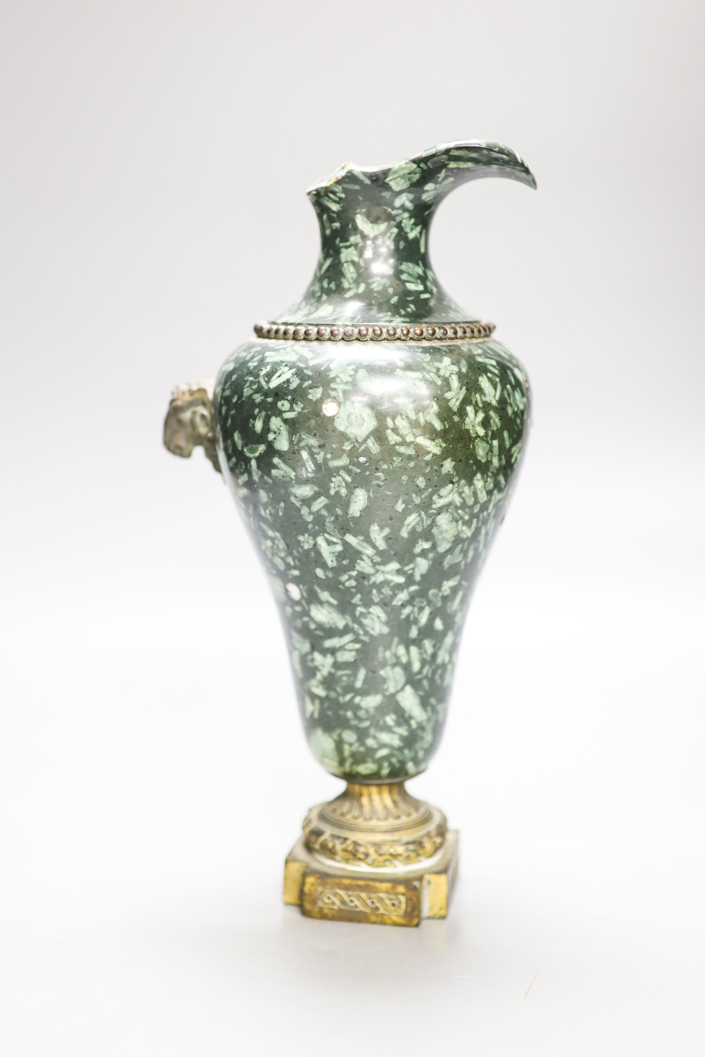 An ormolu mounted green fossil marble ewer, (a.f.) 29cm